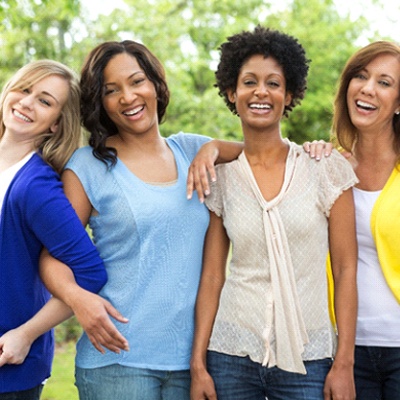 female friends smiling with veneers in Chesapeake